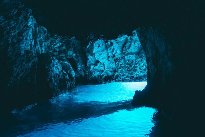 Blue Cave Full-Day Boat Tour with Hvar and 5 Islands - Entering the Blue Cave on Biševo