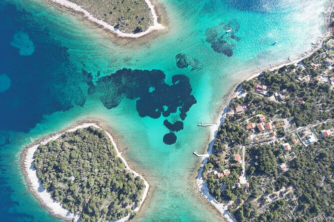 Blue Lagoon Tour from Split with Bottled Water and Wine Included - Trogir: one hour among Romanesque stone streets