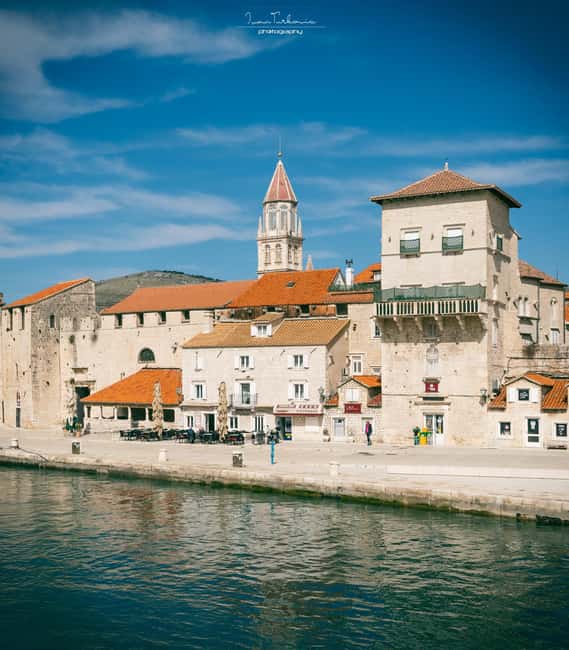 Discover Trogir: Guided Walking Tour of a Medieval Gem - Entering through Trogir’s ancient town gate