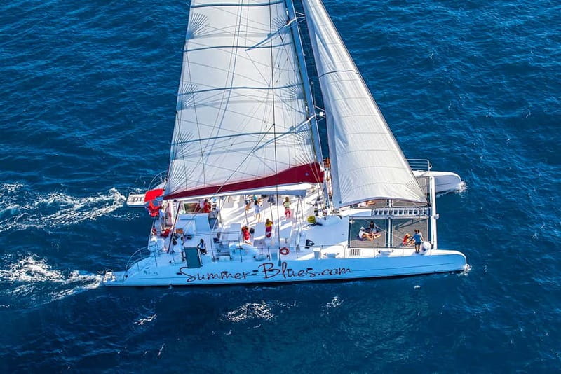 From Split: Catamaran Cruise to Golden Horn & Brač island. - Sunset, cake, and music on the ride home
