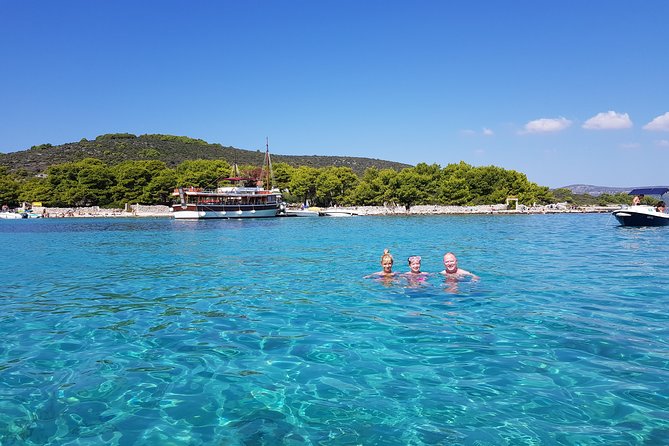 From Split: Half-Day Blue Lagoon and 3 Islands Boat Tour - Trogir: 40 minutes among narrow stone streets