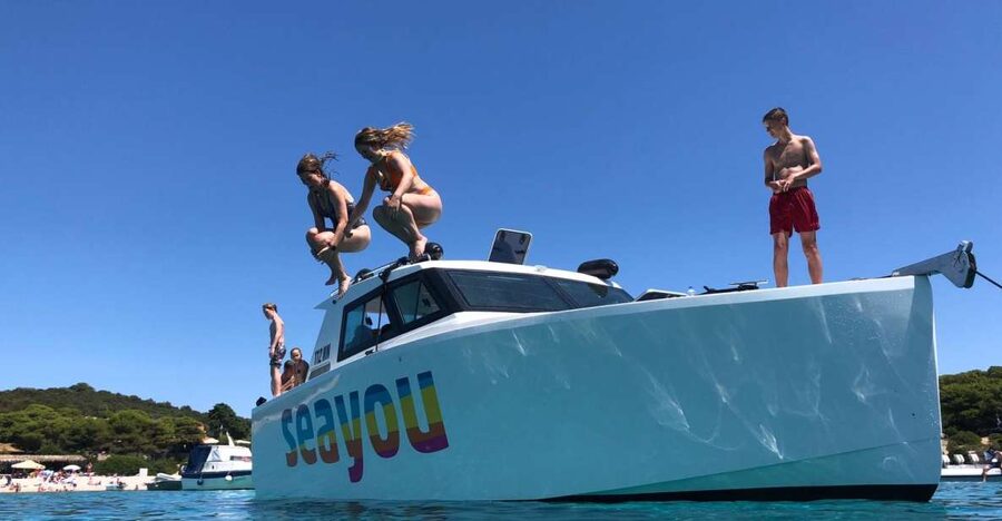 From Split: Luxury Cabin Boat Tour to The Blue Cave and Hvar - Komiza brings the day down to island speed