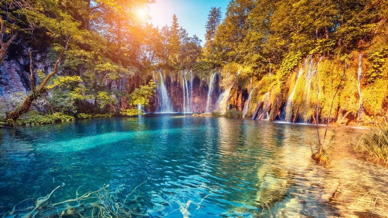From Split: Plitvice Lakes Guided tour - The boat ride gives you a lower, quieter view
