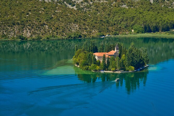 From Zadar: Krka National Park and Waterfalls Day Trip - Šibenik gives the day more substance