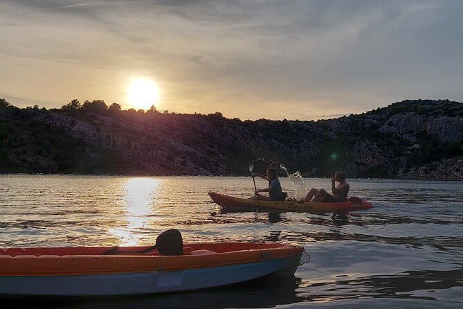 Kayaking and mussels tasting at Krka River estuary-private tours - A shell farm and mussels served on the raft