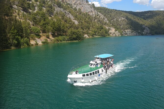 Krka Waterfalls Day Tour with Boat Ride from Split and Trogir - Walking the wooden trails at Skradinski Buk