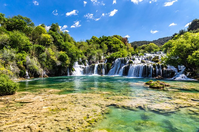 Krka Waterfalls & historic Šibenik - driver&guide, boat cruise, lunch break - Old mills and the working side of the park