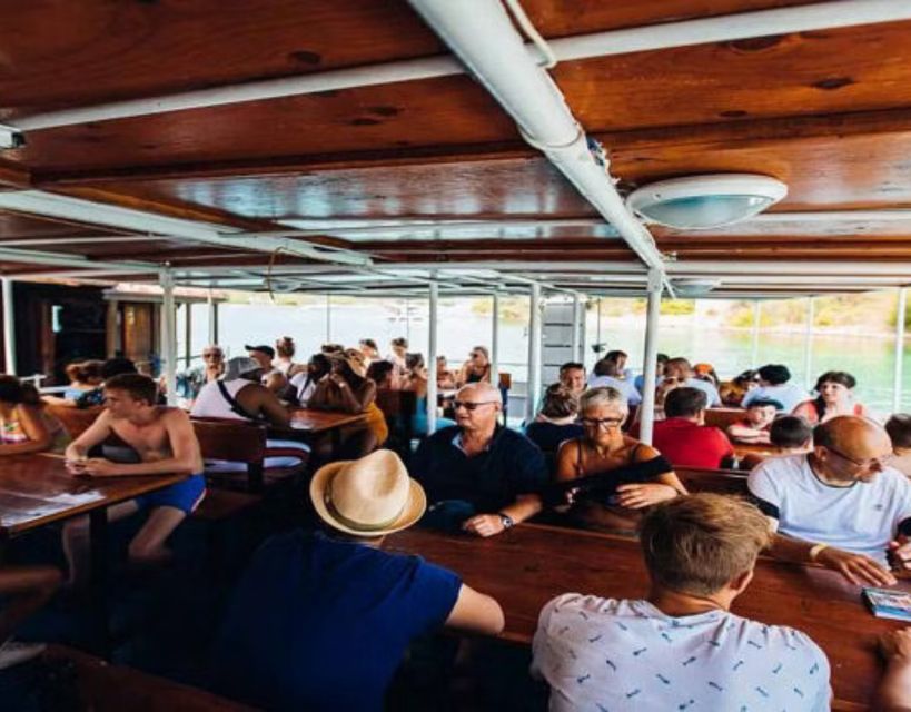 Split: Blue Lagoon Boat Trip with Lunch, Wine and Snorkeling - Lunch, White Wine, and the Party-Boat Mood