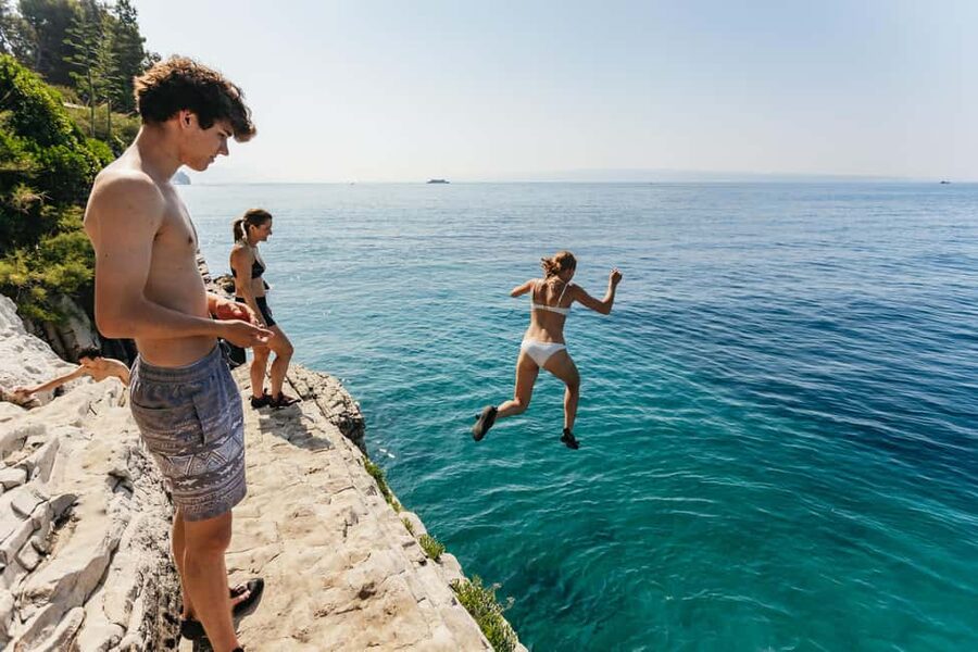 Split: Cliff Jumping & Deep Water Solo Tour - Warm-up climbs before the harder routes