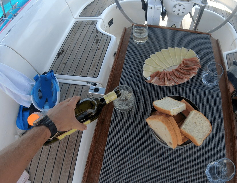 Split: Half Day Sailing Tour with Swim Stop, Snacks and Wine - Wine, cheese, and prosciutto at sea