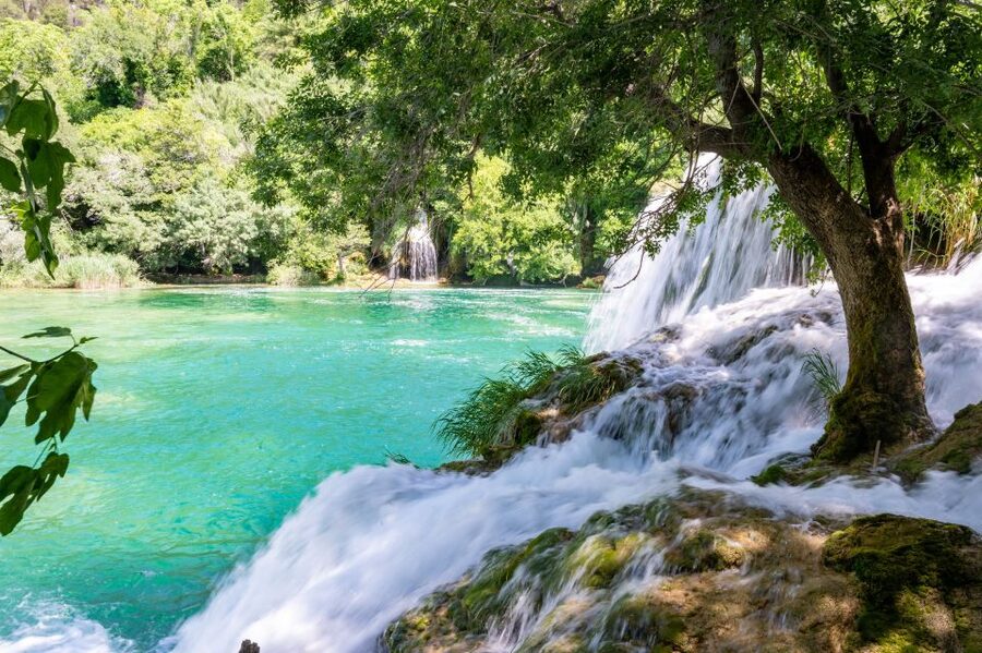 Split: Krka Waterfalls Guided Day Trip with Swim & Boat Tour - The 30-minute cruise toward Skradin