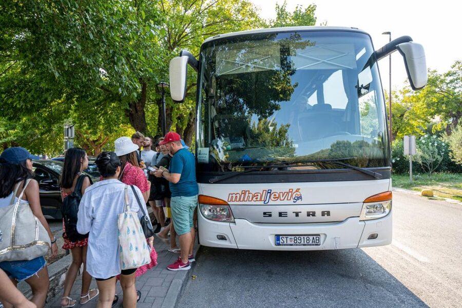 Split: Krka Waterfalls Guided Day Trip with Swim & Boat Tour - Walking among Krka’s waterfalls