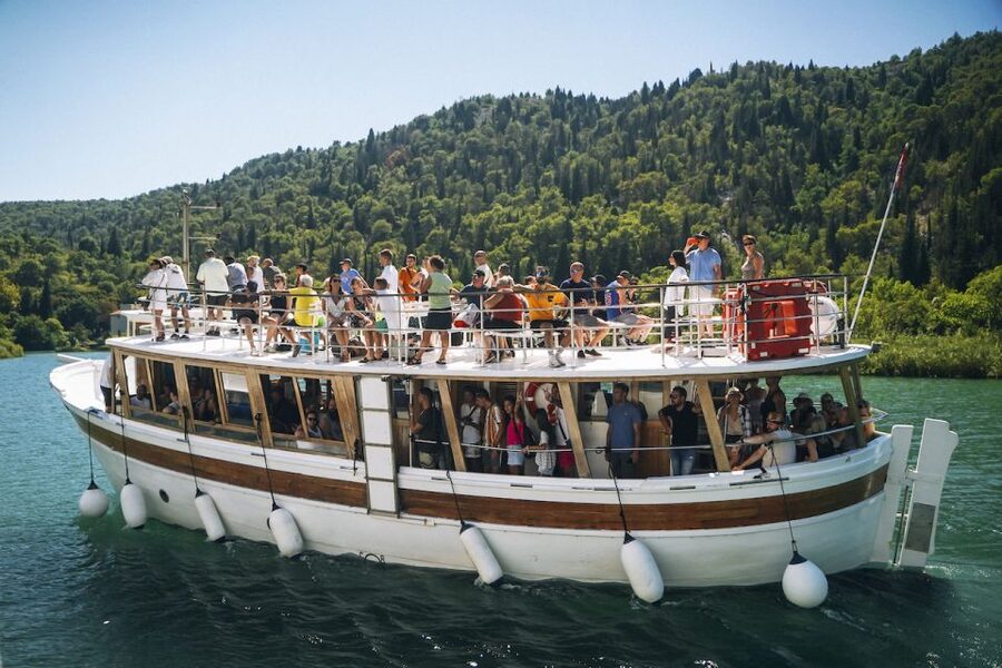Split: Krka Waterfalls Tour, Boat Cruise, and Swimming - The panoramic boat ride to Skradin