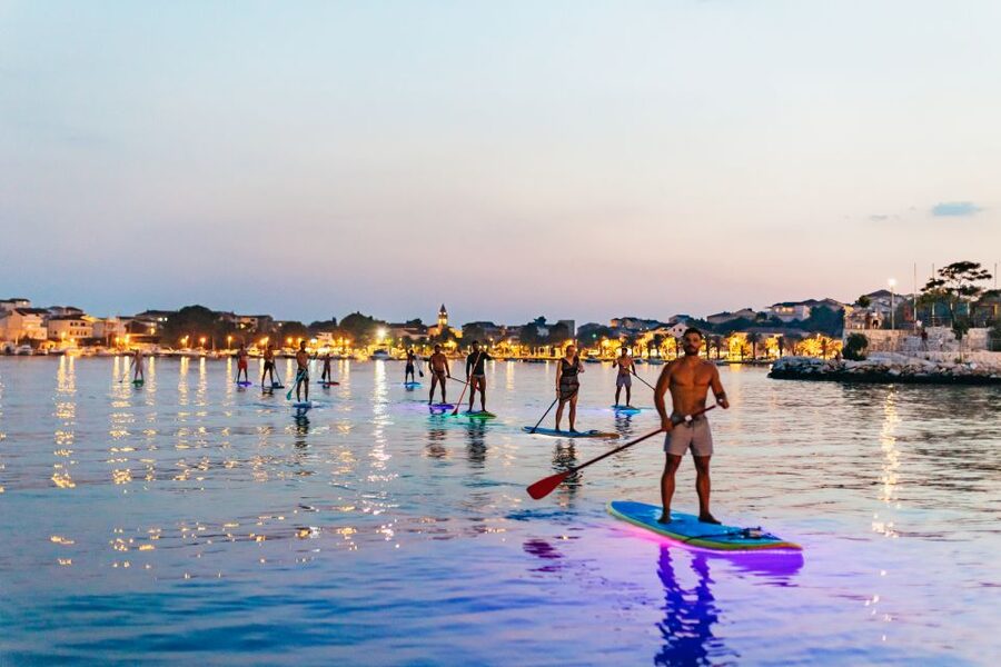 Split: Stand Up Paddleboard Night Glow Tour - Cancellation, languages, and booking flexibility