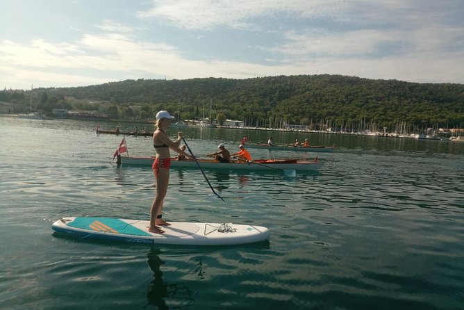 Split Sunset Stand Up Paddle Tour - Swimming, snorkeling, and a choice of cliff jump