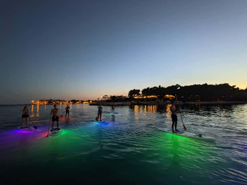 Split: Transparent SUP night Glow tour - White Rocks, Traditional Homes, and the Return to the Sea