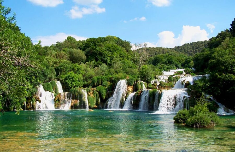 Split/Trogir: Krka National Park Day Trip & Boat to Skradin - Reaching Skradinski Buk by boardwalk